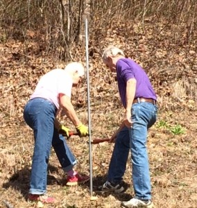 Tom and Jo Anne working on removing pole
